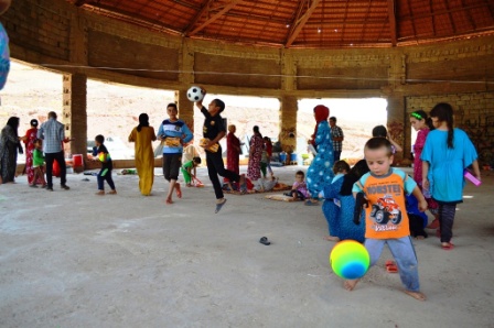 Genel Energy distributed food and essential supplies to IDPs in Slemani, Koya and Taq Taq. The children in this unfinished building were excited to receive toys.